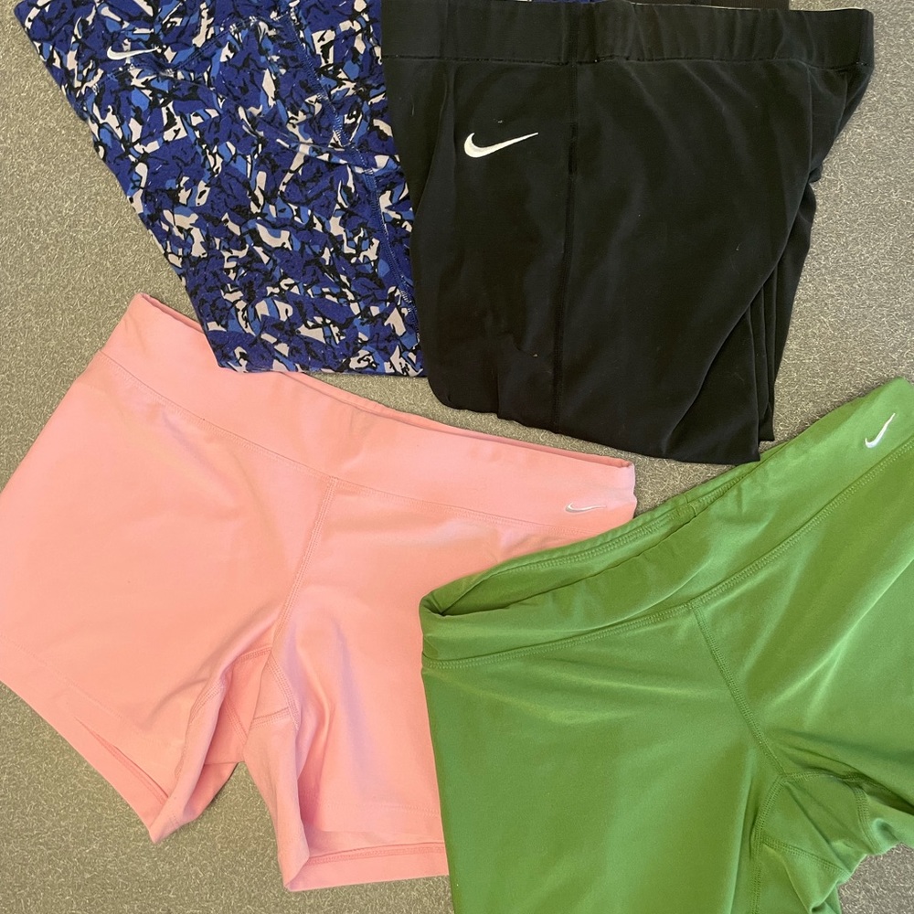 Lot of Nike workout. 2 knee length.  2 pairs short